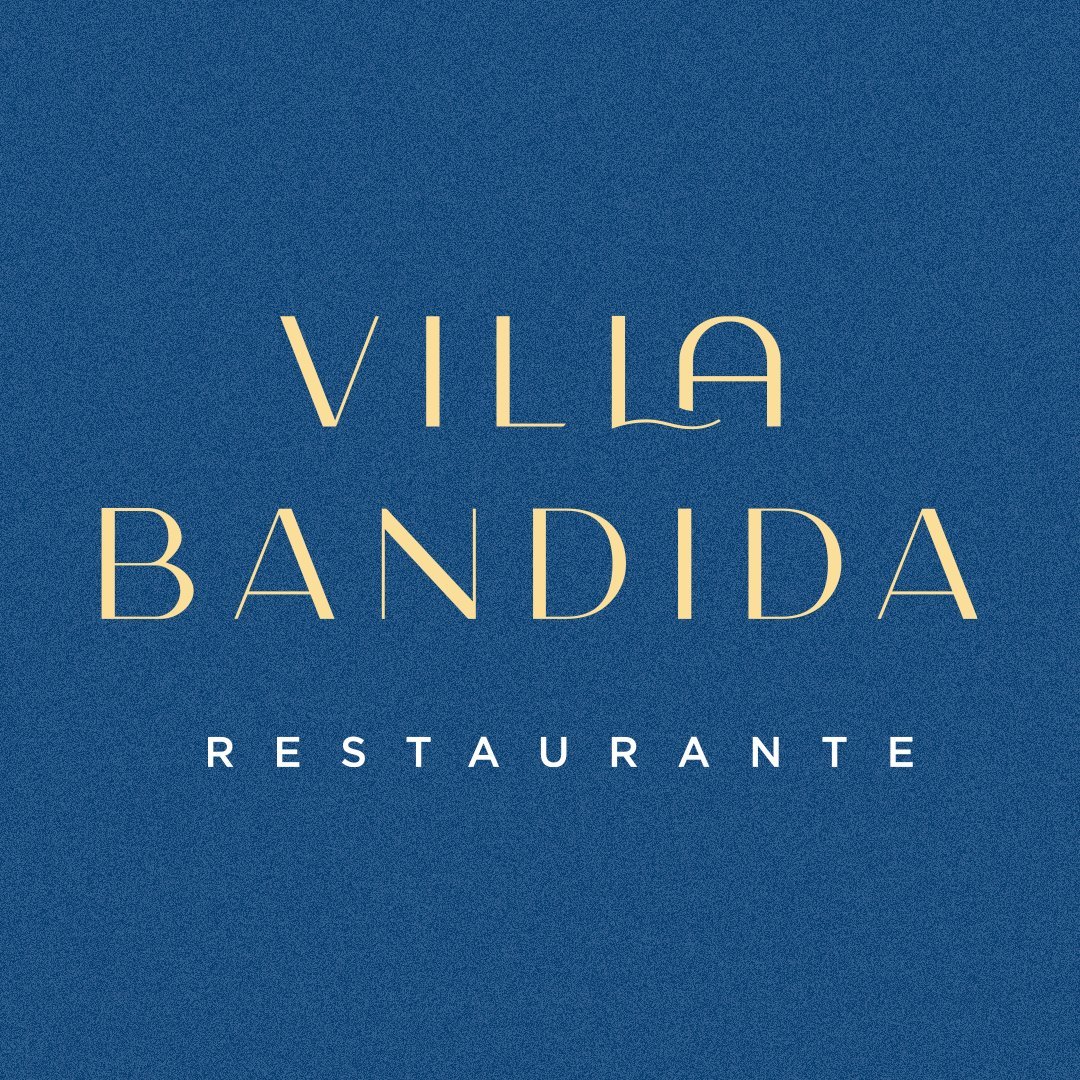 Logo de Villa Bandida restaurante, estilo elegante con fondo azul y tipografía dorada