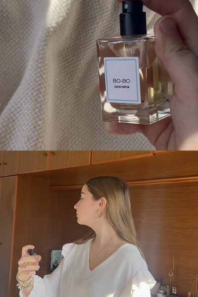 Chica rociando perfume Carner Barcelona "BO-BO" mientras sostiene el frasco, mostrando su uso.