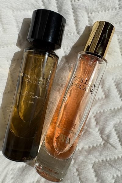 Perfumes Zara Fashionably London y Golden Decade sobre superficie blanca